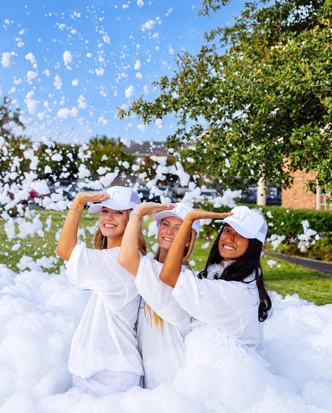 Friends celebrating in the foam